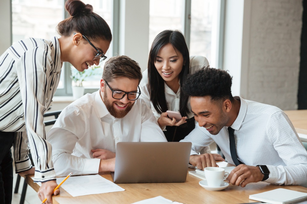 Uzimate team collaborating