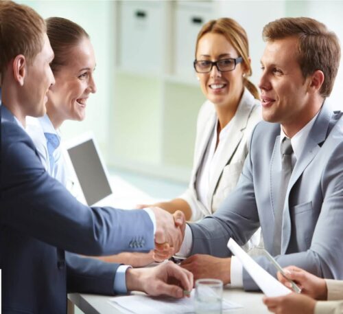 Uzimate Partnership Team Shaking Hands