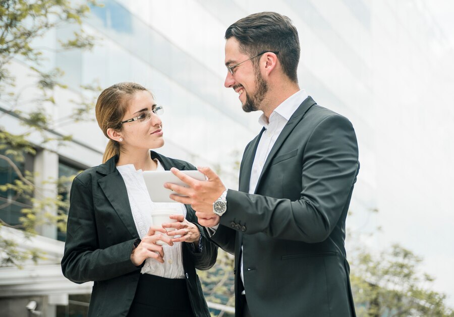 Business professionals discussing loyalty features
